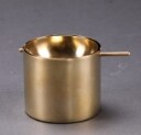 Arne Jacobsen. Stelton vippe askebæger af messing 