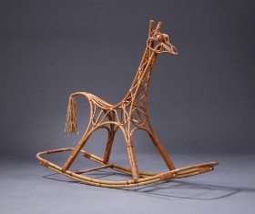 Kay Bojesen, attributed. The rocking giraffe made of bamboo, eyes made of beech wood, tail tassel made of bast