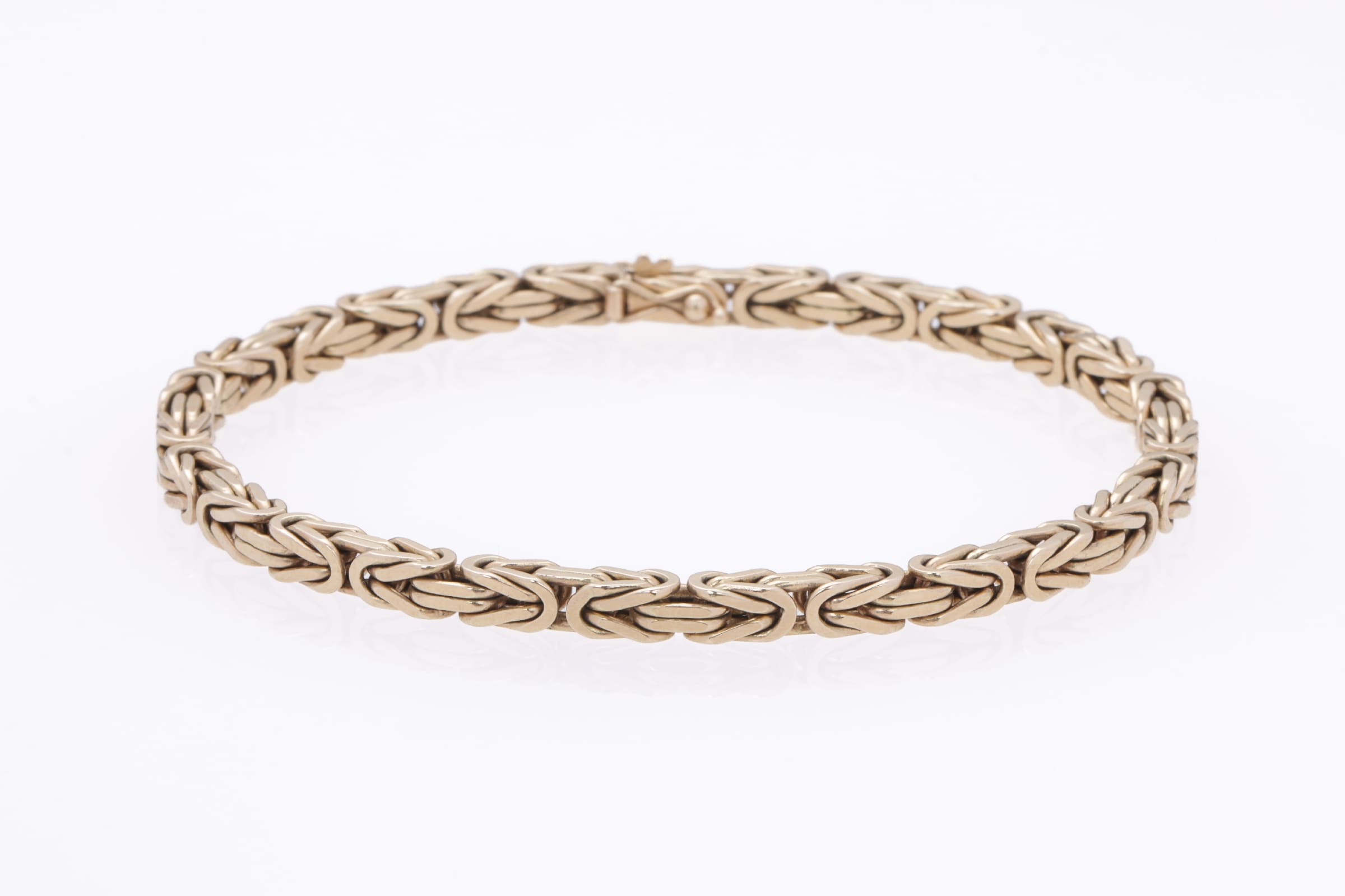 BNH: A bracelet of 14k gold. Weight 26.1 g. Length 22 cm.