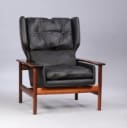 Sven Ivar Dysthe. High-back armchairs with ottoman in rosewood, rarely offered at auction (2)