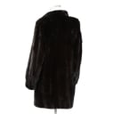 Short coat made of mahogany-colored mink. Approx. size M.