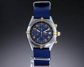 Breitling 'Chronomat'. Herreur i 18 kt. guld og stål med blå skive, 1990'erne