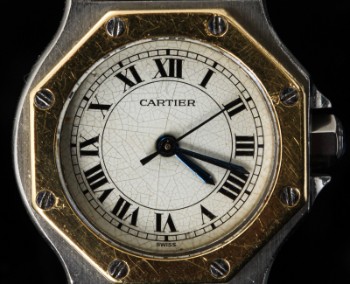 Cartier Santos. Automatische Damenuhr aus 18 kt. Gelbgold und Stahl mit hellem Zifferblatt, 1990er Jahre