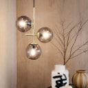971. Dyberg Larsen. Pendant model 'Como' and a pair of wall lamps model 'Futura' (3)