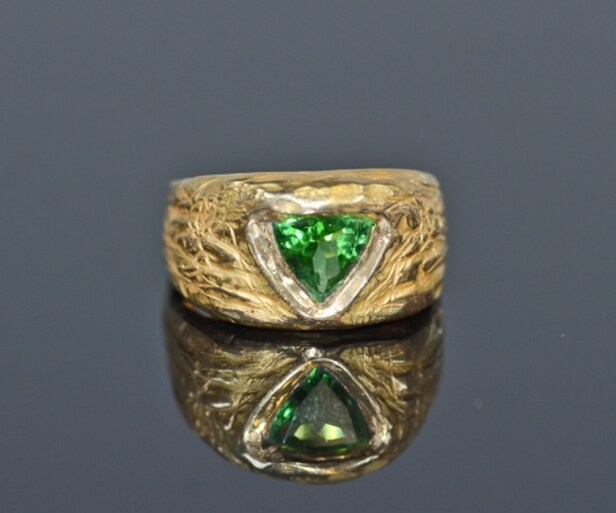Designerring med en Paraiba-turmalin, ca. 1.40 ct., udført af 18 kt. guld, med et certifikat og smykkepas