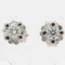 Pair of solitaire diamond earrings, 14 kt. white gold, approx. 0.10 ct