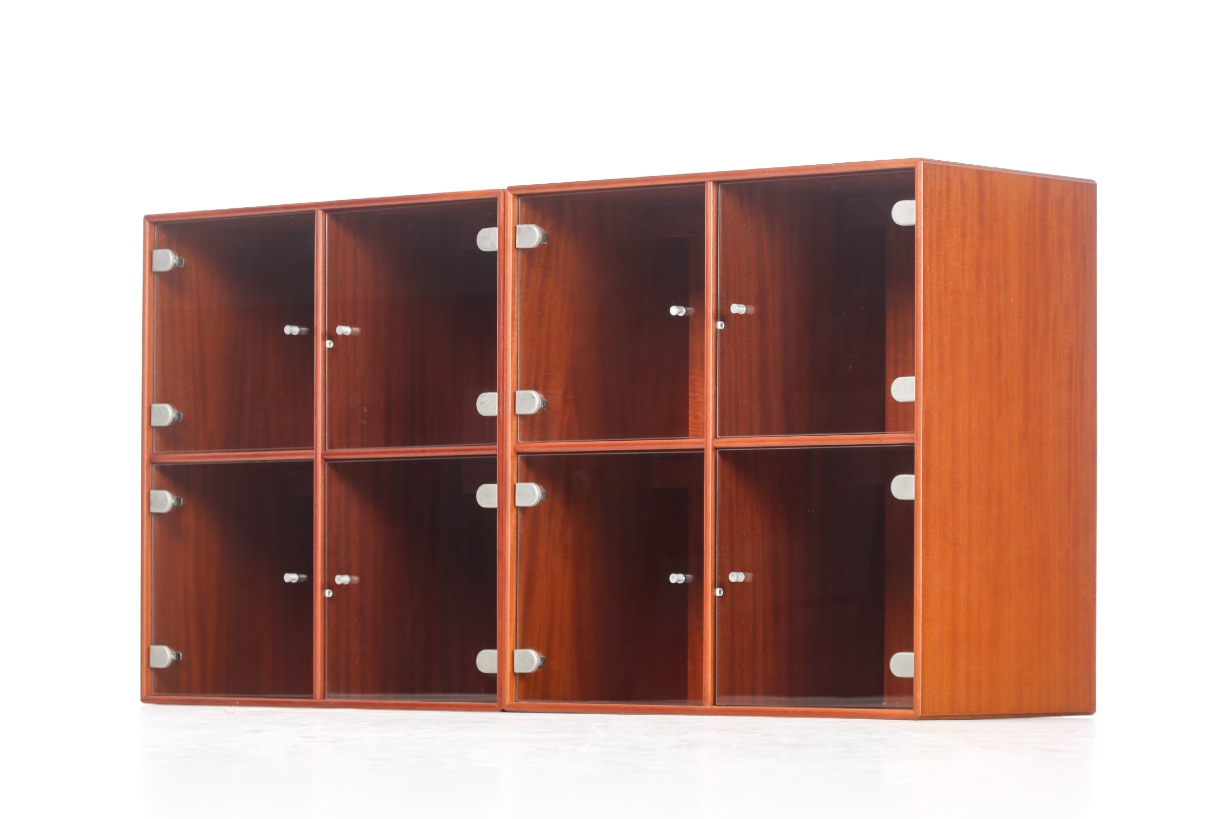 Peter J. Lassen for Montana. Two modules of veneered mahogany with glass doors (2)