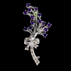 Brooch in rhodium-plated sterling silver adorned with numerous amethysts