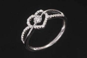 Diamonds By Frisenholm. Ring af 9 kt. hvidguld med brillanter str. 55