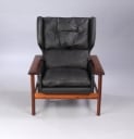 Sven Ivar Dysthe. High-back armchairs with ottoman in rosewood, rarely offered at auction (2)