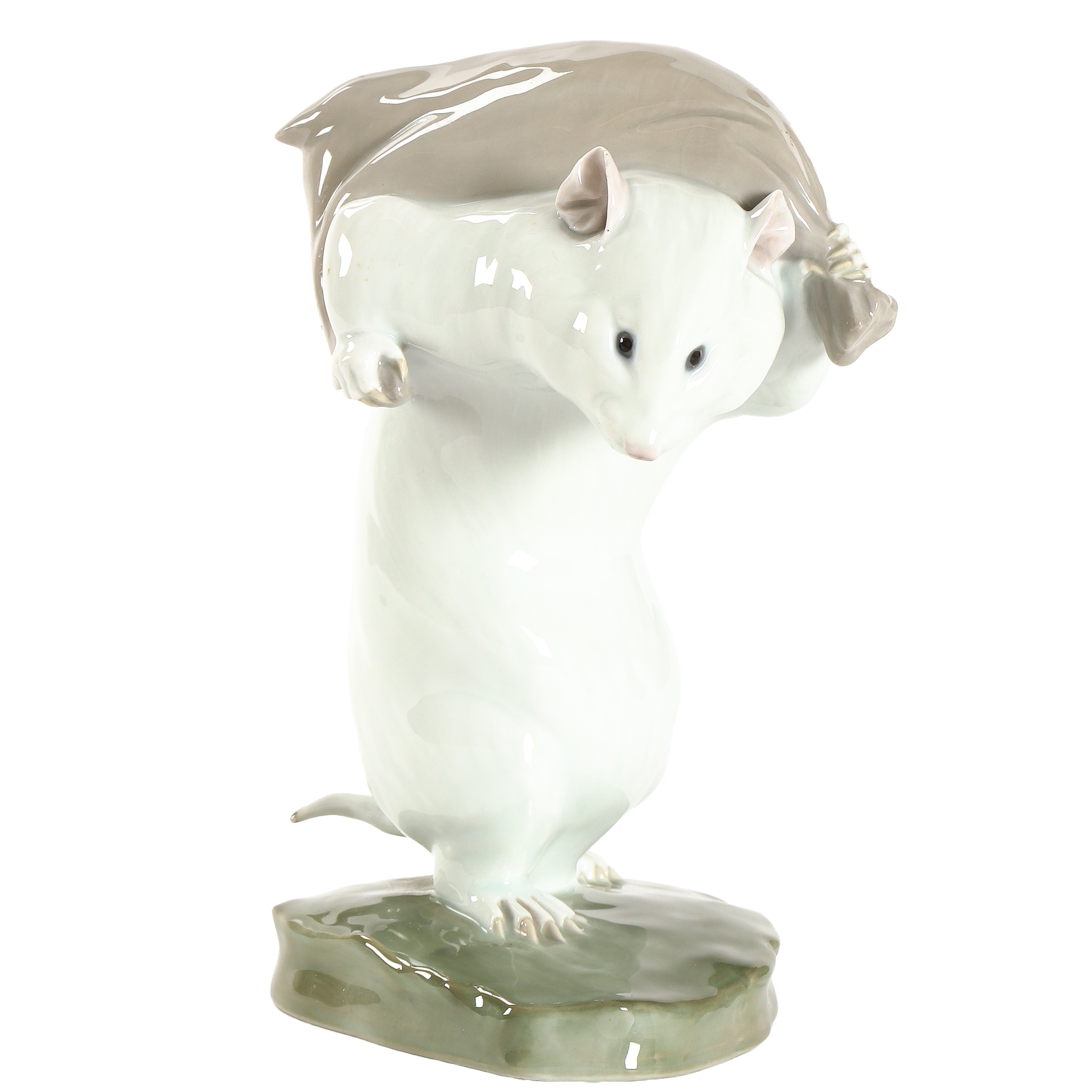 Gebrüder Heubach. 'Hamster mit Geldsack' / 'Hamster with money bag', figurine, porcelain. H. 19 cm.
