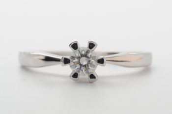 Solitairering med brillant på ca. 0.20 ct. 14 kt. hvidguld, str. 55