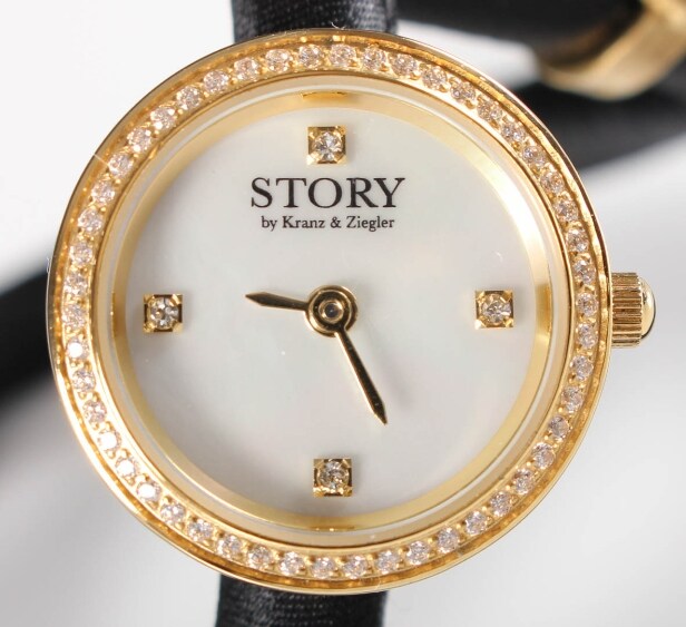 Krantz & Ziegler. Story armbånd med charm og ur