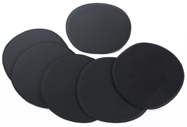 Cushions or seat cushions for Charles Eames chairs, model DSR, black leather. (6)