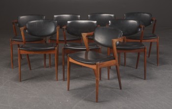 Kai Kristiansen. Eight armchairs / dining chairs made in rosewood, model 42 (8)