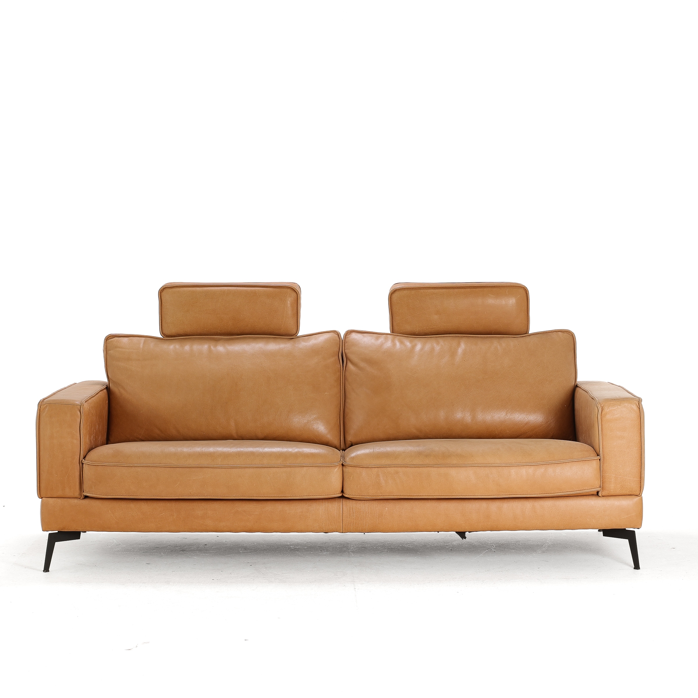 Danish furniture manufacturer circa 2020: Three-seater sofa with patinated leather upholstery.