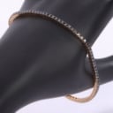 Tennis bracelet in 18 kt. red gold with black diamonds, 2.29 ct.