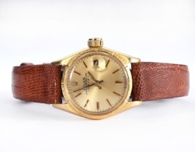 Rolex 'Date'. Vintage dameur i 18 kt. guld med gylden skive, ca. 1964