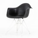 Charles Eames. Model DAR. armchair, black and white