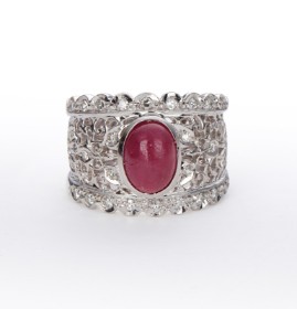 Ruby and diamond ring in 18 kt. white gold with pierced ring rail