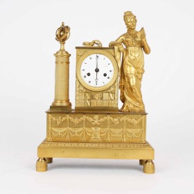 French bronze mantel clock with reading woman and planet in moving spheres, 19th century.