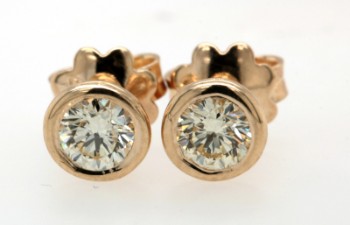 Diamond  Solitaire earrings 14kt with brilliant cut diamonds  0.66ct