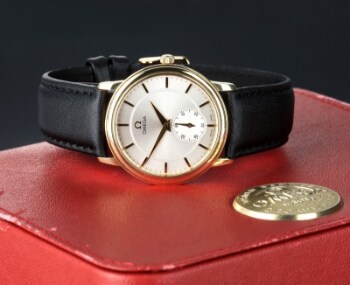 Omega De Ville. Herreur i 18 kt. guld med sølvfarvet skive, ca. 1994