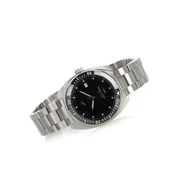 About Vintage herrearmbåndsur af stål.