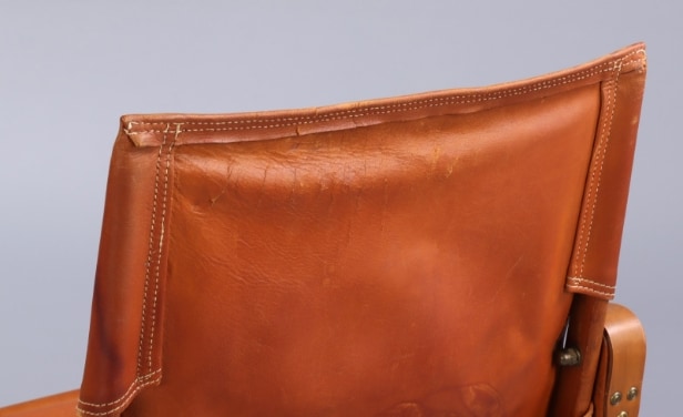 Kaare Klint. Safari chair with seat cushion in cognac leather.