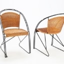 A set of five cantilever chairs made of painted iron and wicker, 1950s (5)