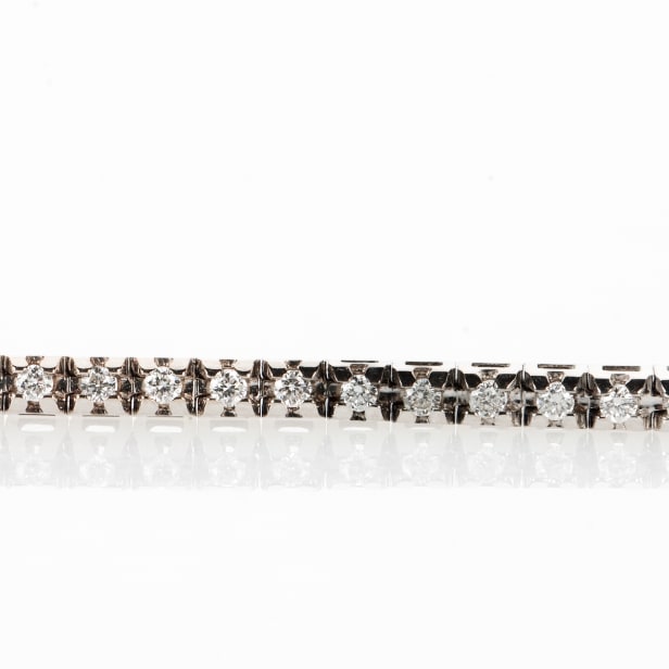 Brilliant tennis bracelet in 18 kt white gold, approx. 0.45 ct.