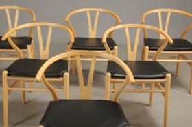 A set of eight Danish-made cold foam cushions for Hans J. Wegner's Y chair, black leather (8)