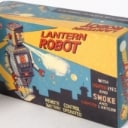 Ha Ha Toy. Robot Piston Action. Batteridrevet Robot samt Lantern Robot og 4 stk. Japanske Robot Låg / topemballage og 3 Danske Filmprogrammer (9)