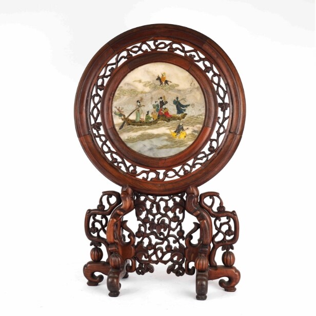 Chinese two-sided porcelain painting mounted in a carved wooden frame on a foot