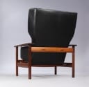 Sven Ivar Dysthe. High-back armchairs with ottoman in rosewood, rarely offered at auction (2)