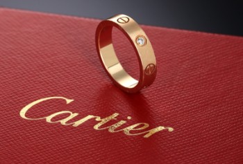 Cartier Love Band brillantring af 18 kt. roséguld prydet med brillant + etui
