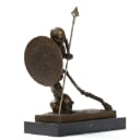 Bronze sculpture, fighting skeleton warrior.