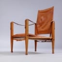 Kaare Klint. Safari chair with seat cushion in cognac leather.